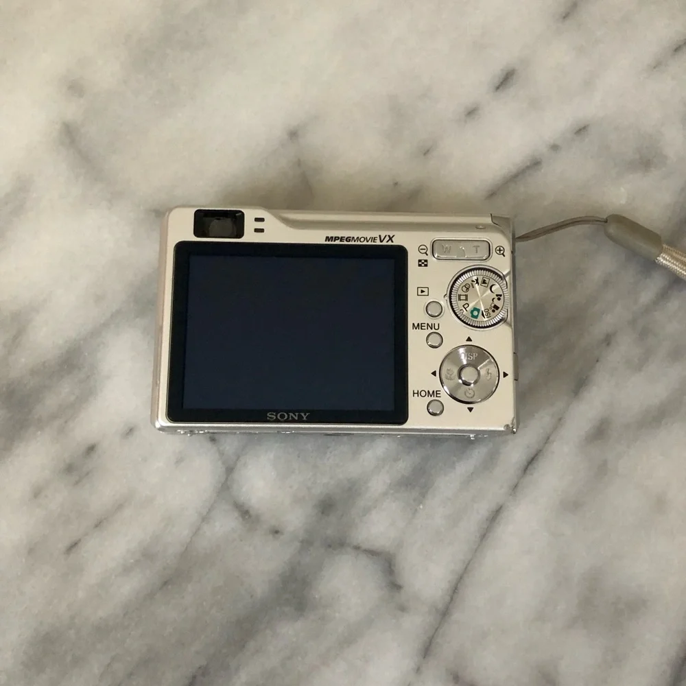 WORKS Sony Silver Cyber-shot Compact Digital Camera with Wrist Strap